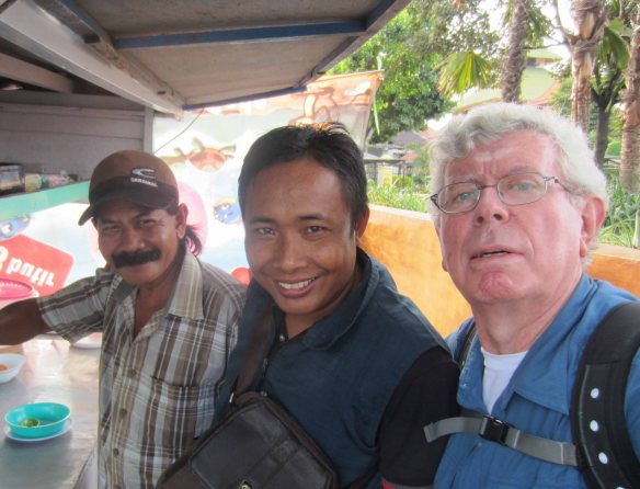 I take a selfie with Pak Sariman (left) and another customer Muhammad Hayat (centre).