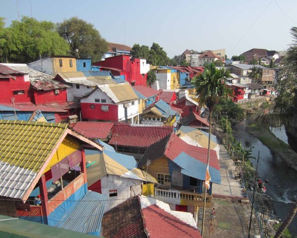 The colourful favela on the banks of the Code River